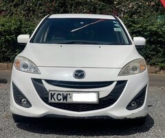 Milky White 7 Seater 15Km/L Mazda Premacy For Sale