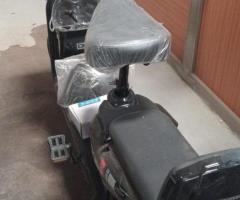 Electric scooter perfect during this high fuel cost era. Very convenient n high speed - 2